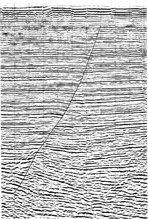 A snapshot of a computer-generated contour map shows a seismic line running diagonally over a faulted area.