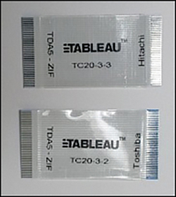 A photograph of a ZIF cable manufactured by Hitachi (TABLEAU TC20-3-3) and Toshiba (TABLEAU TC20-3-2).
