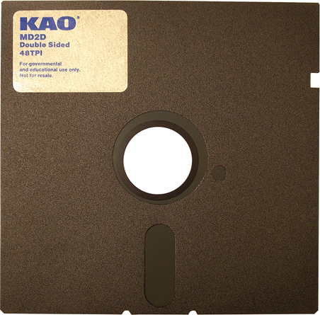 Photograph of KAO double sided 48 TPI floppy disk is shown. A label on the disk reads that it is for governmental and educational use only and not for resale.