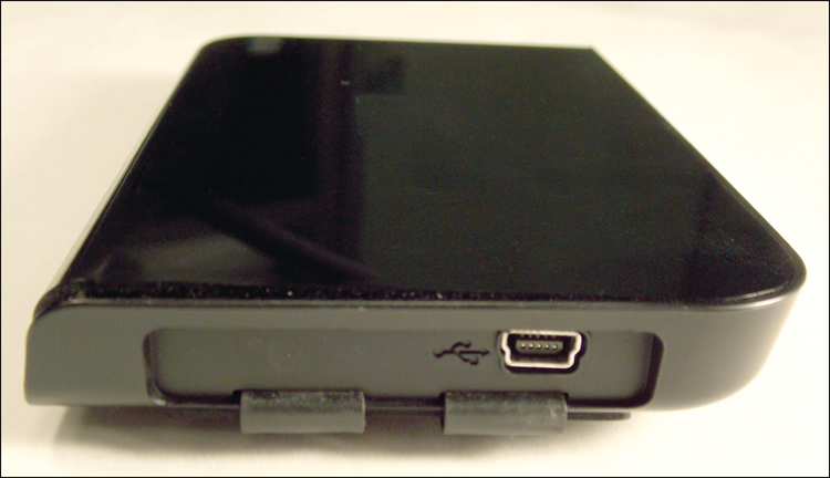 A photograph of a hard drive with a USB port for power is shown.