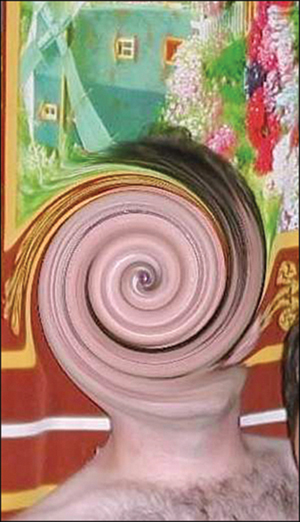 A photograph shows a man, where the face area is hidden by a swirling pattern.