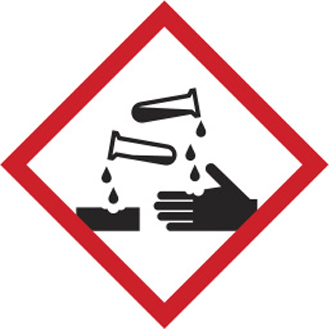 A sign or label for corrosive substances is shown.