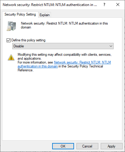 This screenshot shows the Network Security: Restrict NTLM: NTLM Authentication In This Domain policy with the Define This Policy Setting configured to Disable.