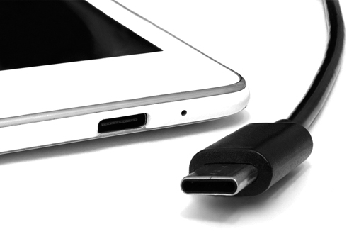 A photograph of a USB Type-C connector and a device with Type-C port is shown.