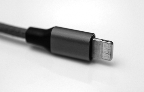 A photograph of a lightning cable is shown.