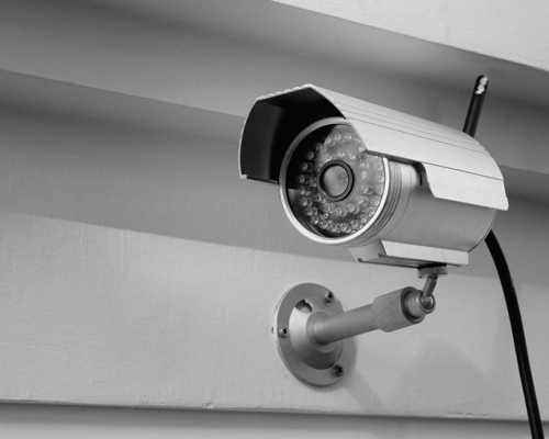 A photograph of a CCTV camera and the RG-59 cable used for connecting it is shown.