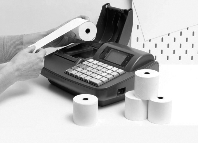 A photograph shows a paper roll placed in the thermal printer. Few paper rolls are placed beside the thermal printer.