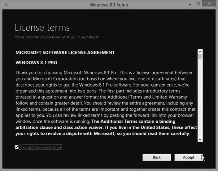 A screenshot of the windows 8.1 set up dialog displays the Microsoft software license agreement. A checkbox for accepting the license terms is given at the bottom of the window along with two buttons, back and accept.