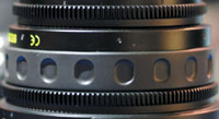 A close-up of the gears on a 35mm prime lens.