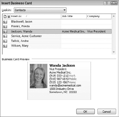 Selecting a business card to include in an email message.
