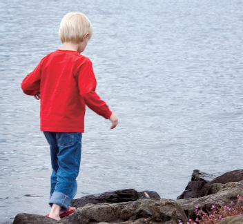 Choose locations for photographing kids based on the child's interests or favorite places. Taken at ISO 100, f/11, 1/125 sec. using a Canon 70–200mm f/2.8L IS USM lens set to 140mm.