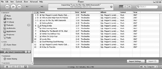 iTunes shows a check mark to indicate that it's done ripping the song.