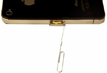 Removing the SIM tray on an iPhone 4.