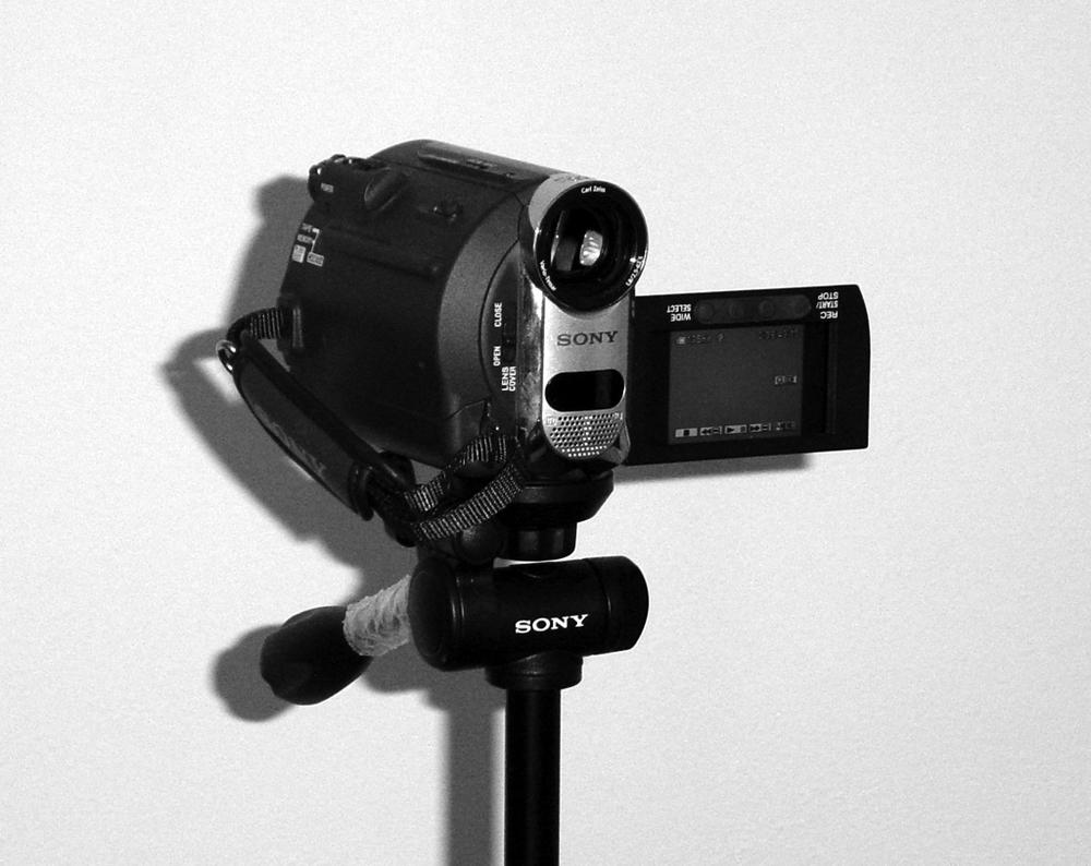 Mini-DV camera on a tripod.