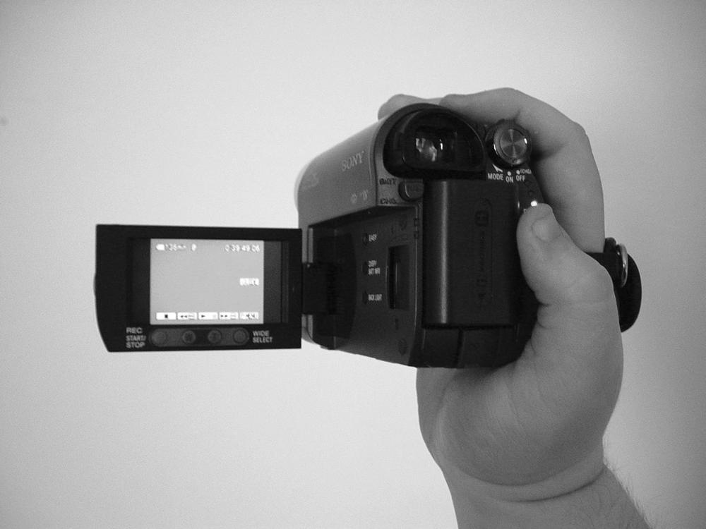Handheld Mini-DV camera.