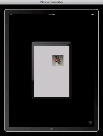 In the embedded iPhone view, we see the image appear to shrink back to its normal size.