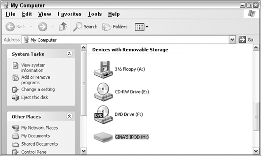 The iPod named Gina's iPod appears as an additional disk in Windows Explorer.