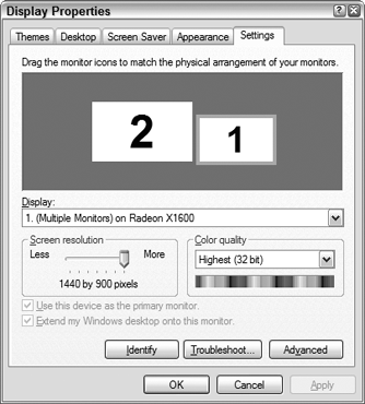Identify and arrange your dual monitors in the Windows Display Properties dialog box.