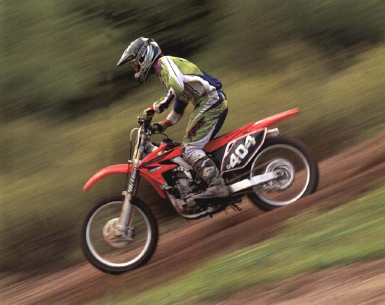 Whether I'm photographing a horse, a motorcycle, or a snowboarder, I love to pan the camera to capture moving subjects. Panning creates that wonderful speed-suggesting background blur. Exposure at 1/30 second, f/16.