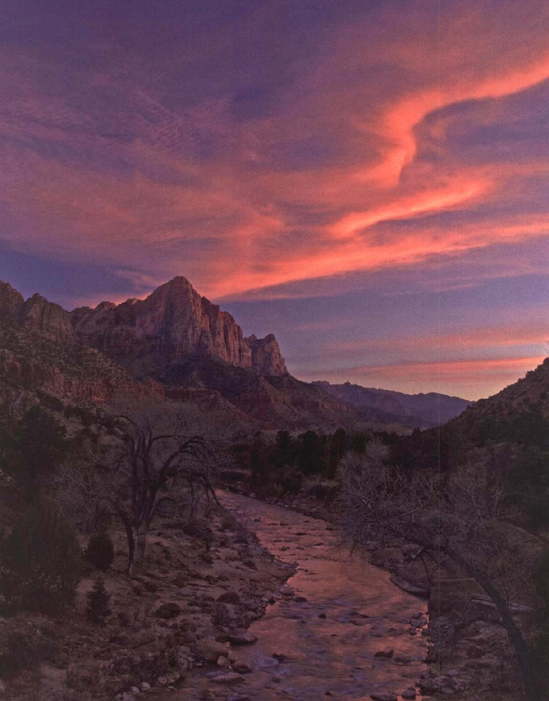 At the south end of Zion National Park, the Virgin River runs between the road and the canyon walls, affording you easily-reached spectacular sunset landscapes. This photo was taken in early March with an exposure of 1 second at f/11. Exposure at 1second, f/11.