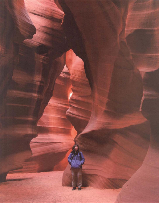 Like a bucket placed under a slow-dripping faucet, a long exposure can gradually collect light where it seems there is none. In fact, if the exposure is long enough, it's possible to produce brightness out af darkness. This 30-second exposure in Antelope Slot Canyon shows that effect. Exposure at 30 seconds, f/14