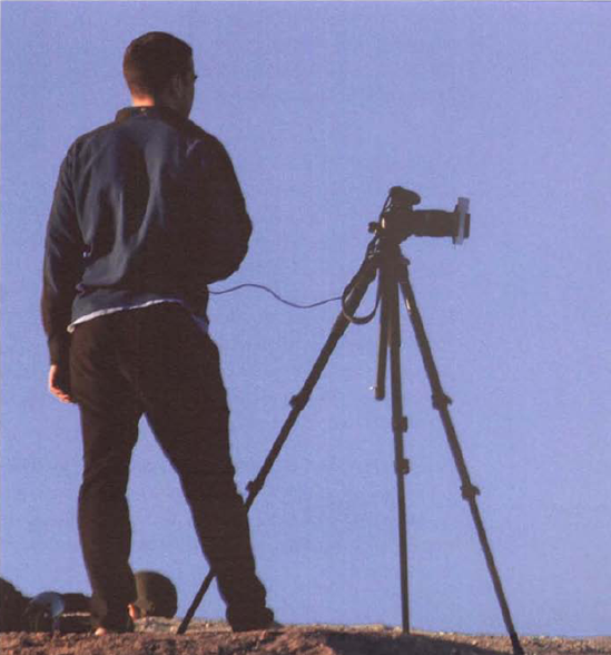 This photographer at Zabriskie Point in Death Valley clearly knows the principles of getting sharp pictures. He's using both a sturdy tripod and an electronic shutter release cable.