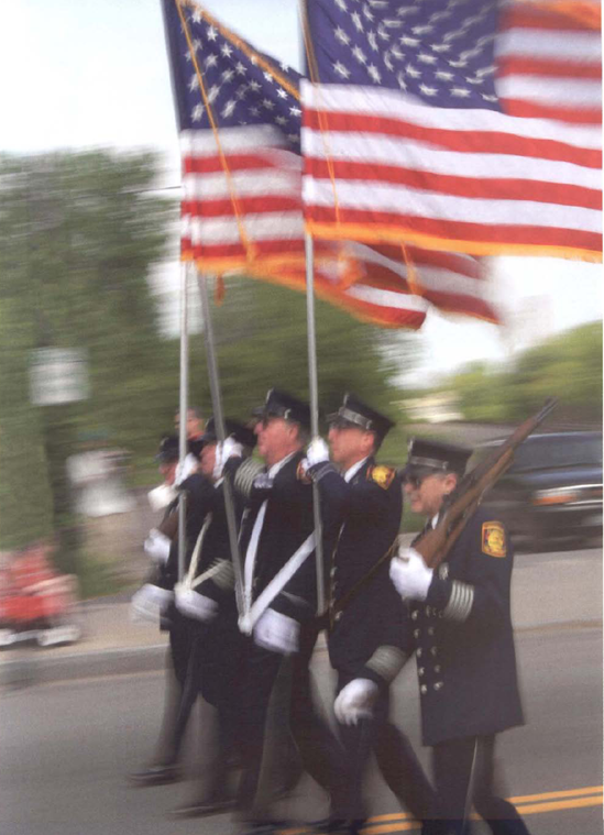 Every motion photographer loves a parade. What better place to practice your motion techniques? Exposure at 1/6 second, f/32.