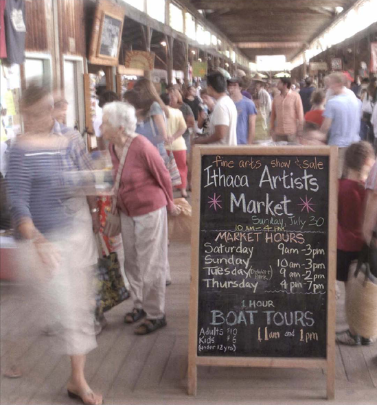 A slower shutter speed than the 1/4 second used bere would have worked even belter to blur the people into a blurry stream of motion. I took a separate picture of the sign at a fast shutter speed and used photoshop to replace the somewhat blurred sign in the original scene. Exposure at 1/4 second, f/22.