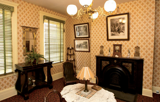 The front parlor of the Petersen House where Mary Lincoln grieved (see C on the map). Taken at ISO 2000, f/4, 1/50 second with a 20mm lens and a flash bounced off the ceiling.