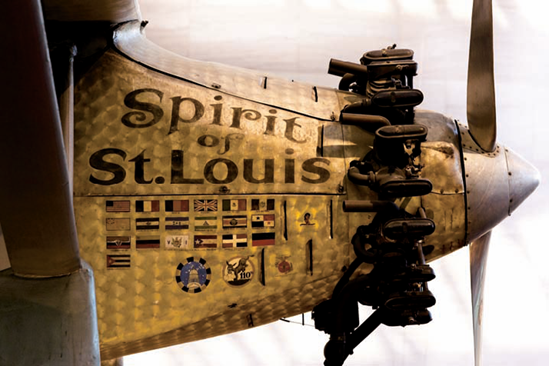 A detail of Charles Lindbergh's Ryan NYP Spirit of St. Louis. The flags represented some of the many countries Lindbergh flew to after his trans-Atlantic voyage. Taken at ISO 2500, f/5, 1/80 second with a 180mm lens.