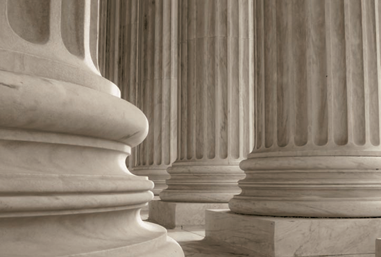 The columns on the west side of the U.S. Supreme Court Building (see C on the map). Taken at ISO 400, f/16, 1/100 second with a 50mm lens.