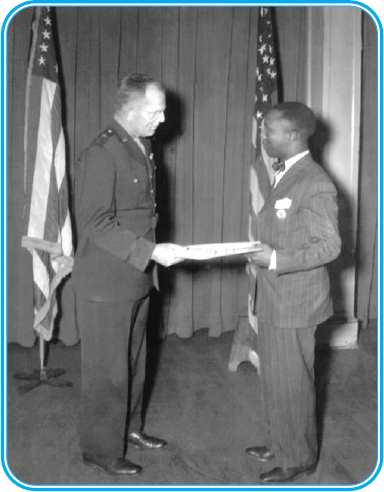 William Coffee receiving the Meritorious Service Award from General W. Preston Corderman, Chief, ASA, 3 April 1946