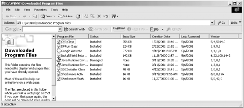 When you click the “View Objects...” button, Internet Explorer opens up the Downloaded Program Files folder. This folder will show you the ActiveX components that have been downloaded. In this example, components for several third-party programs have been downloaded. All except the Java runtime components are active.