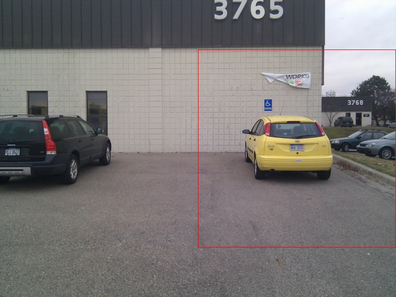 Bounding box drawn around the yellow car