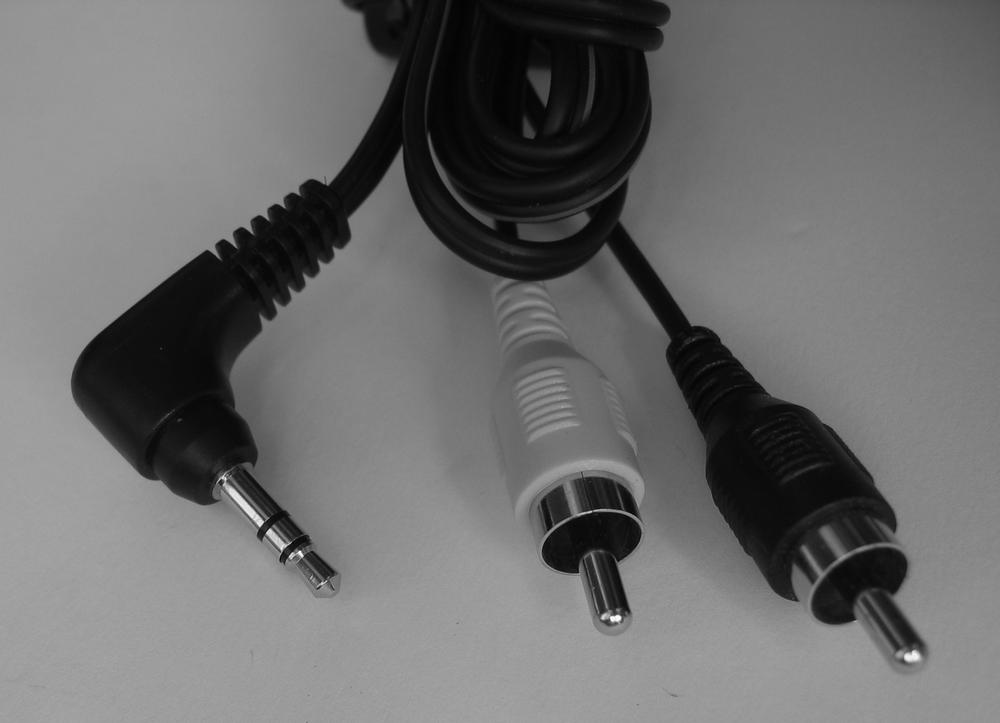 Push the tiny, 1/8-inch plug into your PC’s Line Out or Speaker jack, and plug the two RCA plugs into your TV’s Audio In ports. (The red plug goes into the right port; the other plug goes into the left port.)