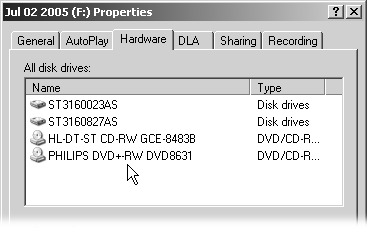 Before buying blank discs, look at the model number of your DVD burner to see what DVD formats it supports: DVD-R, DVD+R, or both (DVD+/-R). The Philips drive shown here supports both DVD formats; you can tell because it lists DVD+/-R in its model number. If your drive shows only a “+” or a “-”, buy blank disks that match that particular format.