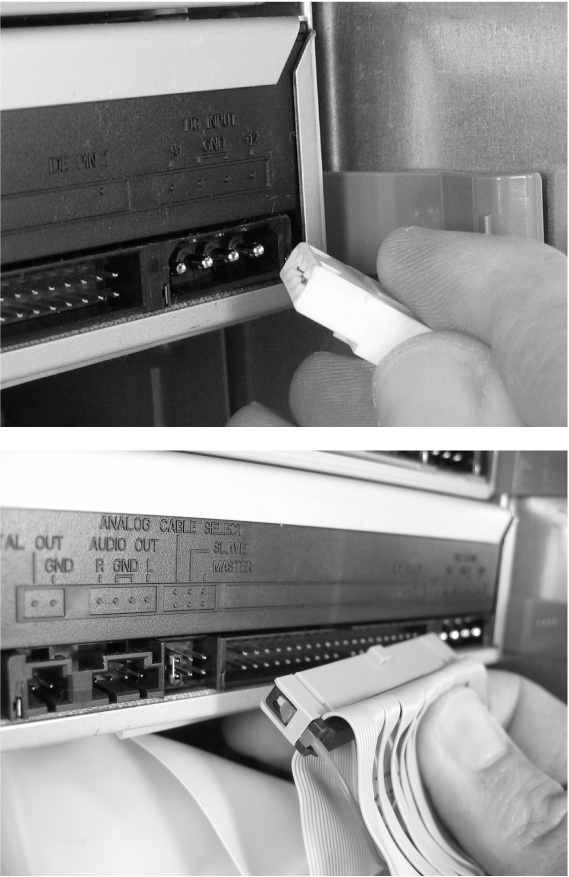 Top: Your PC’s internal power supply comes outfitted with extra power cables (like the one white-tipped one shown here), ready for you to plug them into any newly installed devices (a new CD drive, for instance). Push the white “Molex” connector onto the four waiting pins on your drive and—presto—you’ve got juice.Bottom: Most new drives come packaged with their own ribbon cable, which connects between the drive’s rear-side connector (shown here) and an identical connector, usually labeled IDE 1, on your motherboard. If you’re just replacing a drive, feel free to reuse the old cable on the new drive. Ribbon cables fit only one way; make sure the notch and raised spot on the two connectors mesh as you push the ribbon cable into the drive.