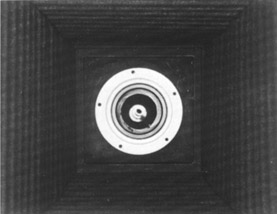 Figure 6-11 A photograph made with a ring light to show an unpainted lens flange in a view camera, which can be a source of flare light. Recessed areas of this type are difficult to illuminate with conventional light sources.