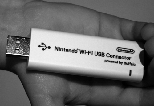 The Nintendo Wi-Fi USB Connector is a small device that plugs straight into a computer’s USB port.