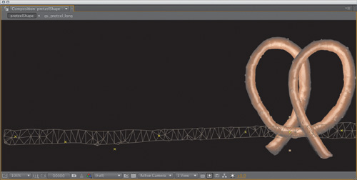 The outline of the pretzel source can be seen in wireframe view; this is the Puppet mesh. The pins, in yellow, are effectively the joints.