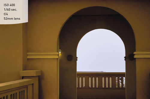 Manual mode allowed the sky to be balanced with shadows of the archway even though the camera meter was calling for a bit more underexposure because of the brighter sky.