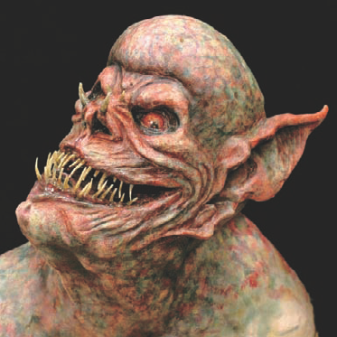 This creature mask was painted with several broken-up colors and squiggly lines called mottling. (Creature by Lone Wolf Effects / Bill Johnson)