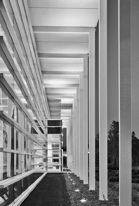 Department of Homeland Security, Omaha, Nebraska. Recycled brick mulch from local brick plant. Full cut-off light fixtures to reduce light pollution. Building is 66 percent more efficient than ASHRAE 90.1 required. Soffit overhang on western facade. White roof to reduce heat island effect.