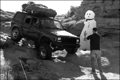 A snowman on a hot desert day? Looks like it to me.