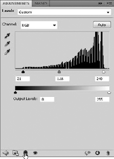 Click the Clip to Layer button in the Adjustments panel to tie the adjustment to the layer below it.