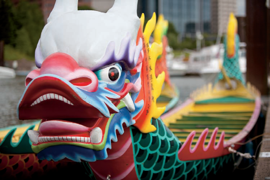 A shallow depth of field was achieved when I shot this racing dragon boat by using my largest aperture. The busy urban background was kept in check by shooting wide open. Exposure: ISO 200, f/2.8, 1/4000 second.