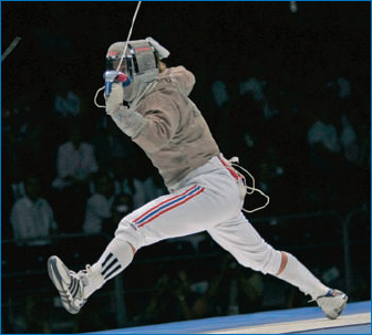 U.S. fencer Mariel Zagunis in her winning attack. The camera is set for high-speed, stop-action shots of a saber blade in motion, the lighting of the athlete and not the audience, and narrow depth of field.