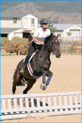 Before shooting a big event, practice your timing and photography at a small schooling show or training arena to learn to get the best equestrian shots and how to work easily around horses and riders.: © Amy Alden Timacheff