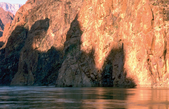 The shadows on the cliff wall are the point of this photograph.