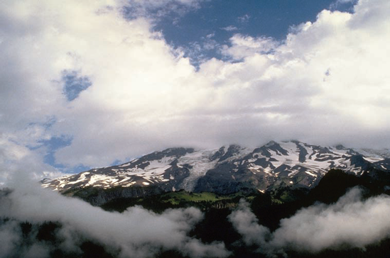 Clouds make this photo of Mount Rainier.